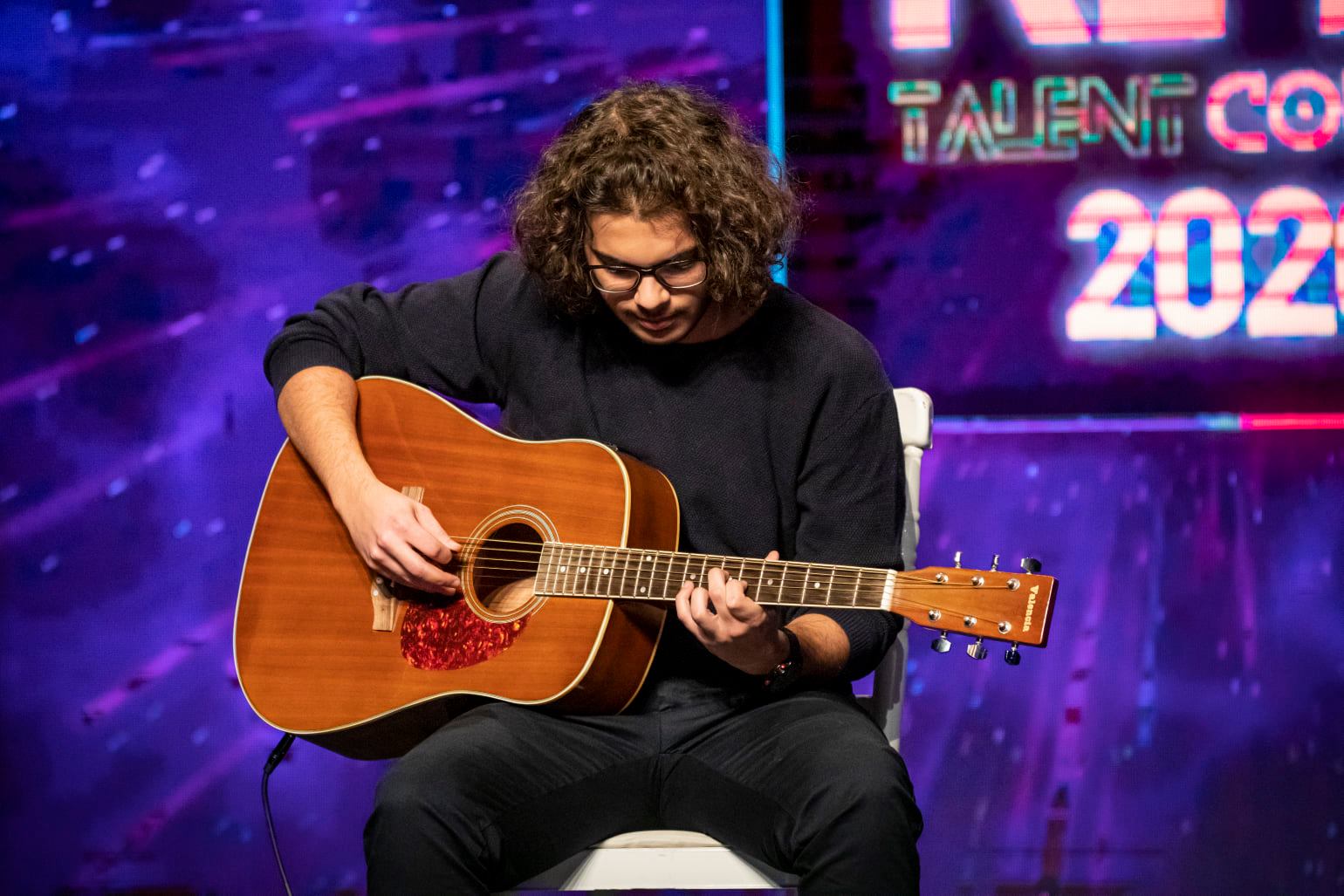 Nizar Masadeh performing at Rise Talent Show